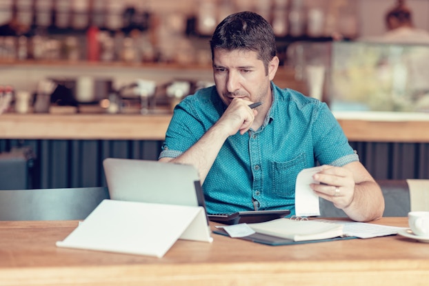 Business owner works on financials