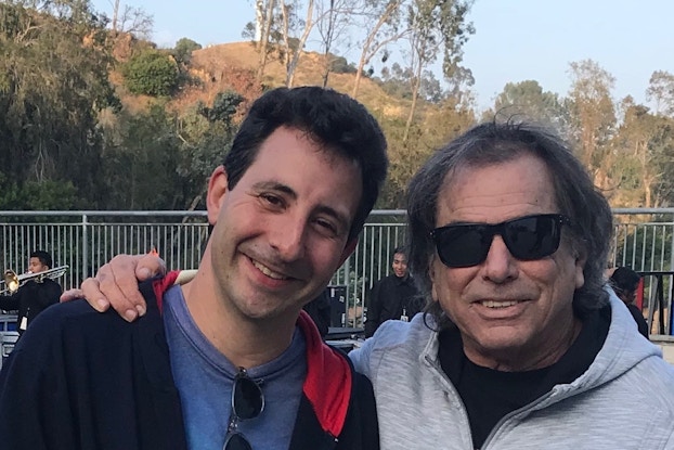 Jonathan Shank, left, with drummer Mickey Hart.
