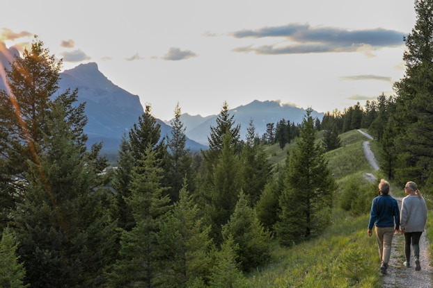 two people hiking in mountains
