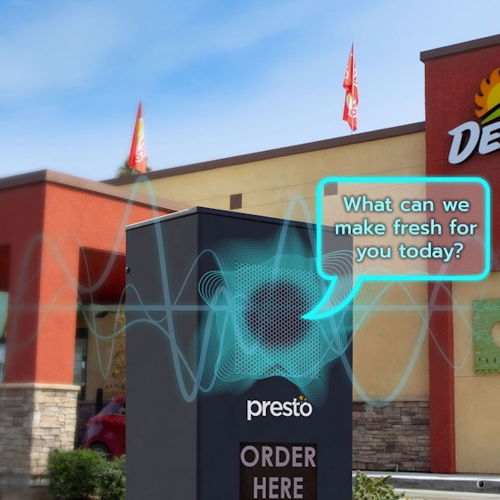 Image of Presto Voice system set up outside of a Del Taco location for use on its drive-thru line.