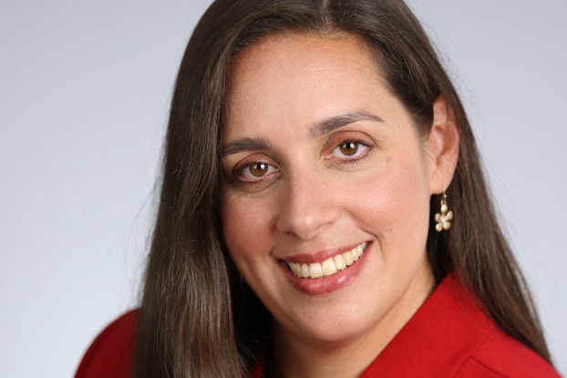  Headshot of Allison Auclair, Group Vice President of Product Management at Oracle Netsuite.