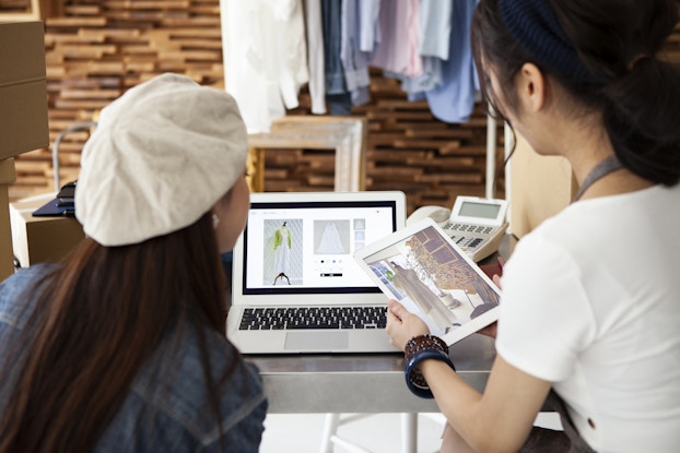 Business owners create an online shop