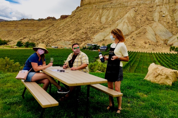  Taking wine-tasting to the great outdoors at Bookcliff Vineyards.