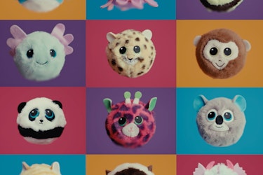 A four-by-three grid made up of multicolored squares, with each square containing a different Beanie Bouncer plush toy. The Bouncers are spherical plush toys designed to look like animals. From top left, the Bouncers look like a blue shark, a purple octopus, a black-and-yellow bee, a pale blue axolotl, a leopard, a monkey, a panda bear, a pink giraffe with black spots, a gray koala with blue ears, a light yellow cat with orange stripes, a Siamese cat with blue eyes, and a pale blue dragon with purple horns.