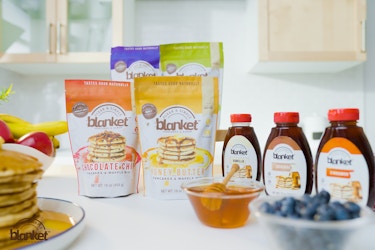  Display of products by Blanket Pancakes & Syrup. 