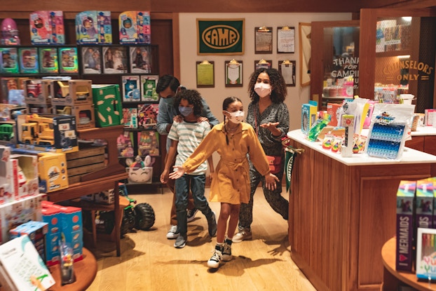  Family inside of a CAMP store location.
