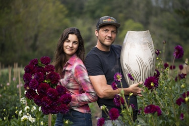  Emily and Josh Copus of Carolina Flowers in their dahlia field. 