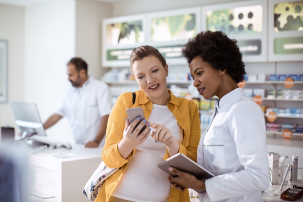 Two customers complete a small business review.