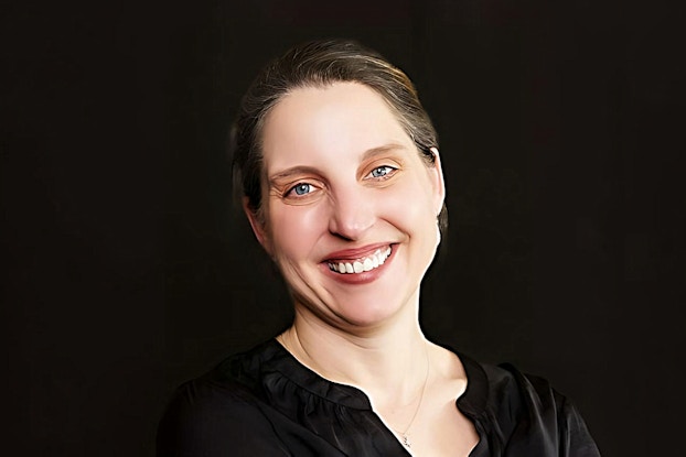 Headshot of Deb Harrison.