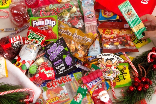 Display of candies sold by Economy Candy on a tabletop.