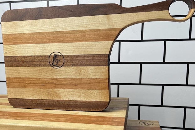 display of wood cutting boards created by Eddie Thomason.