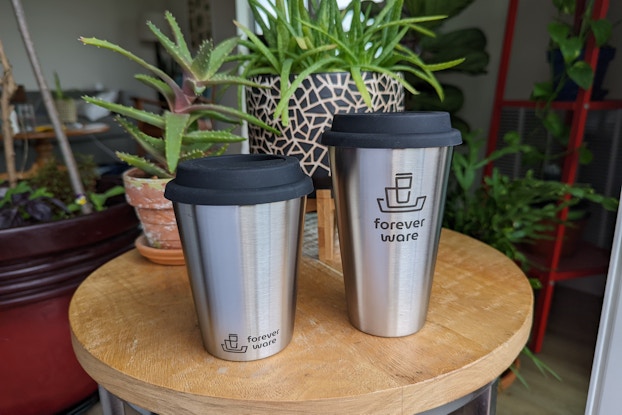  Two different sized reusable mugs by Forever Ware.