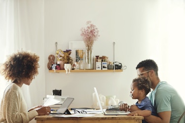  Young family balances work and home life. 