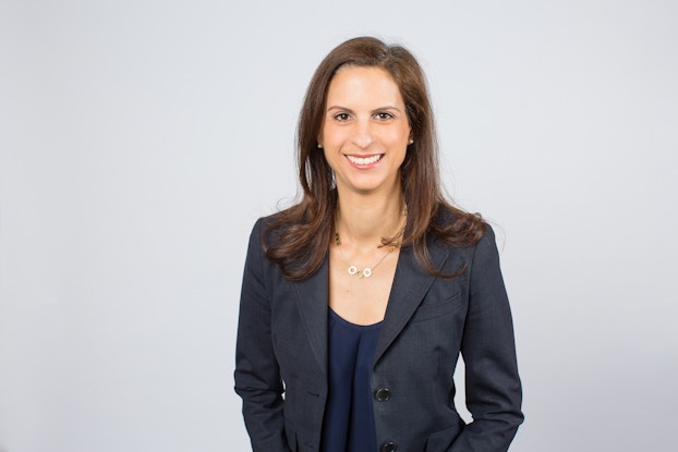  Headshot of Gina Taylor, Executive Vice President and General Manager of Business Blueprint and Banking.