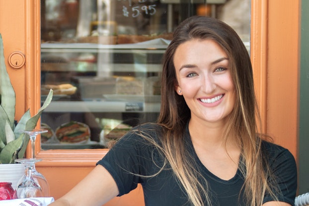 Headshot of Haley Pavone, the founder and CEO of Pashion Footwear.