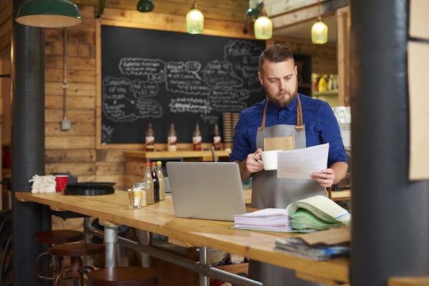 Entrepreneur checks his accounts