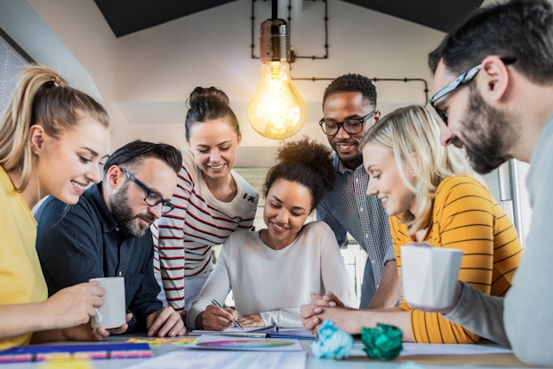 A team works on an innovative concept