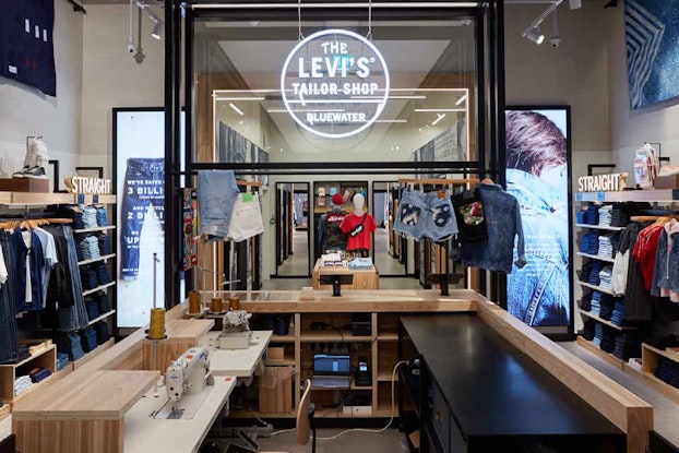 Shoppers can customize their purchases on the spot at the Lievi's store, one of the micro-experiences retailers are using to engage with consumers in physical stores.
