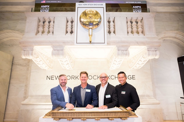  Loop Media executives at the New York Stock Exchange.