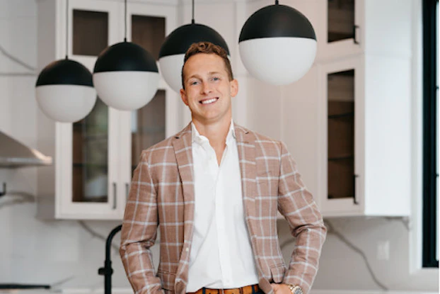 Headshot of Taylor Lucyk, Founder of the Taylor Lucyk Group, a real estate brokerage firm in New Jersey.