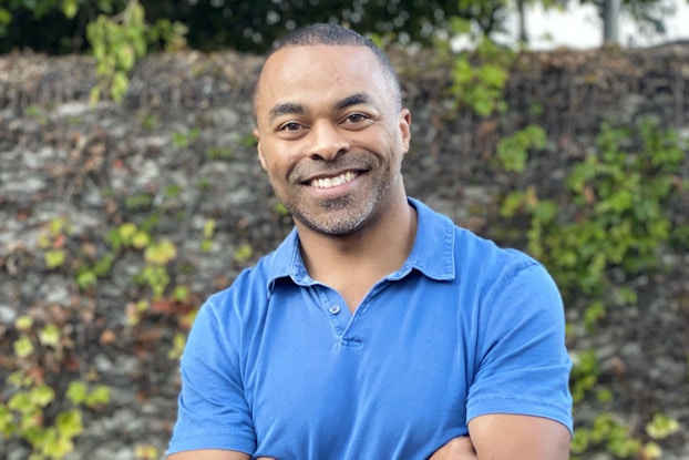  Headshot of Marc Washington, founder of Muniq.