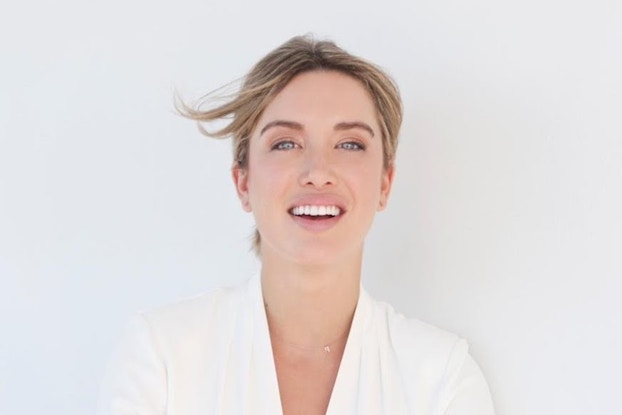 Headshot of Melissa Boloña, founder of Beauty and the Broth.