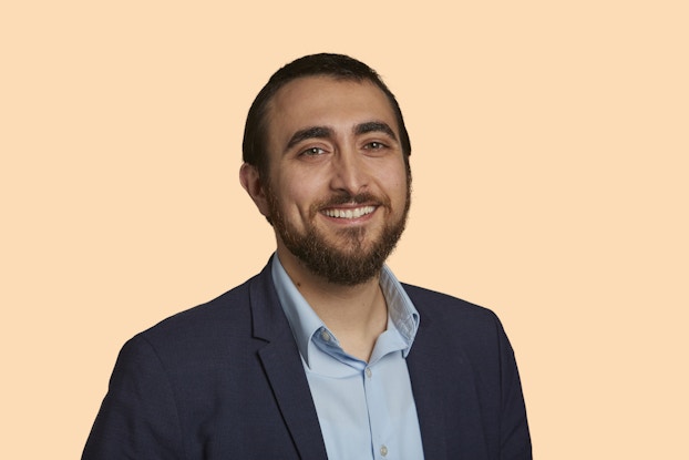  Headshot of Andreas Michaelides, Chief of Psychology for Noom.