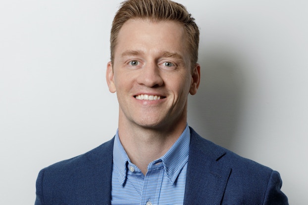 Headshot of Nate Checketts, co-founder of Rhone.