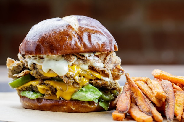 Jalapeno popper burger and fries by Native Foods.