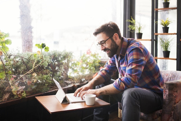 man working on laptop