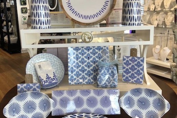 Display of blue and white housewares on sale at Splurge.