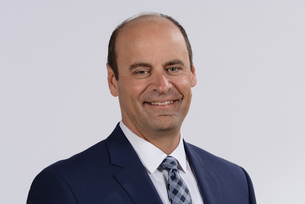 Headshot of Johnson & Johnson's chief information officer, Jim Swanson.
