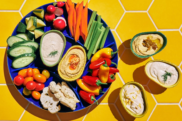 Vegetable platter and dip display with dishware from the Tabitha Brown for Target line.