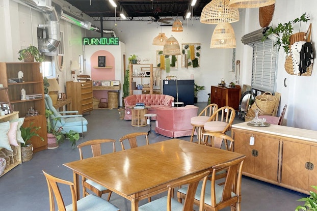 An antique store displays eclectic furniture and decor