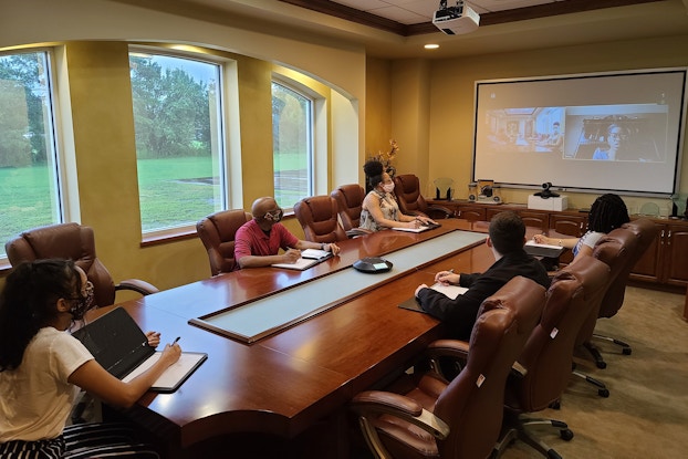employees in conference room at Will Technology, Inc.