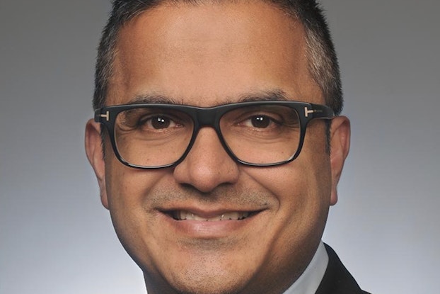 Headshot of Zahir Khoja, general manager for Afterpay North America