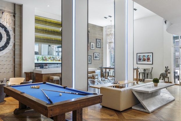  San Francisco-based Hotel Zetta's lobby with a pool table and other games.