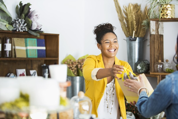 saleswoman helping customer
