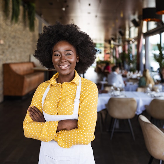  Female business owner in restaurant 
