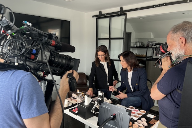 Bobbi Brown and her camera crew preparing products for a TikTok recording.