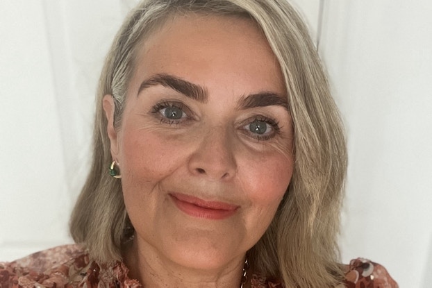 Headshot of Louisa Booth, founder of Popmask.