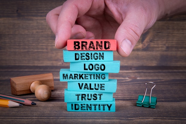 stacked blocks with words like brand, design and logo