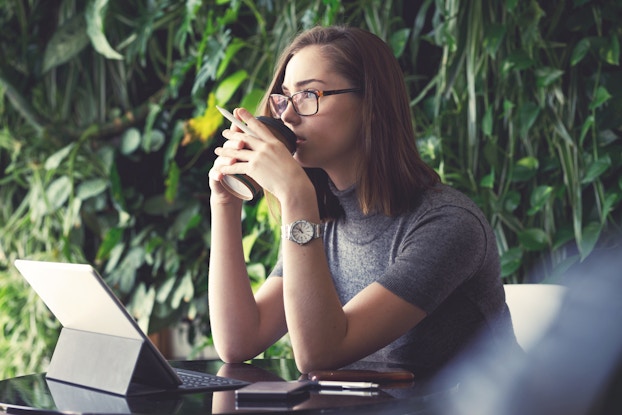 woman at laptop brainstorming