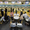 people in a bowling alley