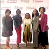 a group of women standing together