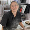 a woman smiling at camera