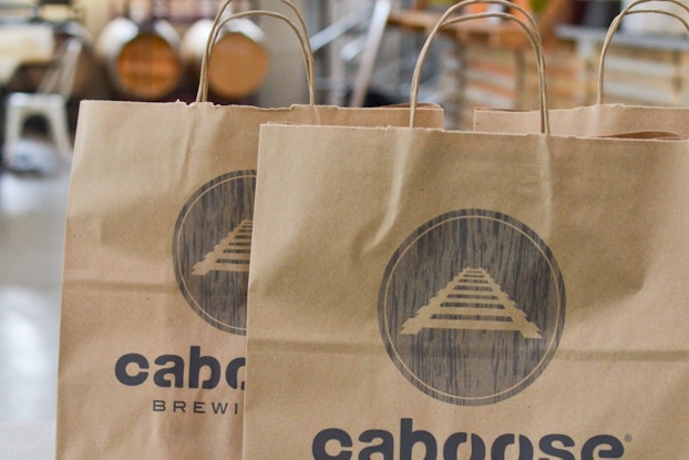  bags with caboose brewing co. branding