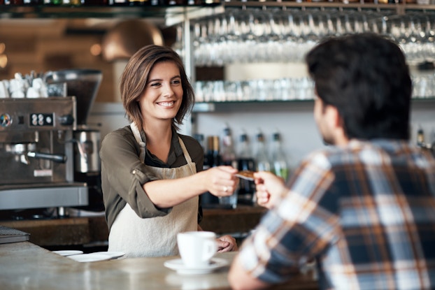 Barista Guiding Customer