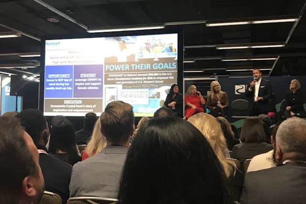 Joseph Vizcarra, Coca-Cola group vice president of shopper marketing for Walmart and Sam's Club, details a recent promotional campaign at the Path to Purchase Expo (P2PX).