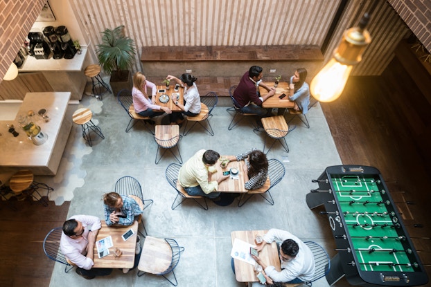 Workers at desks in open office